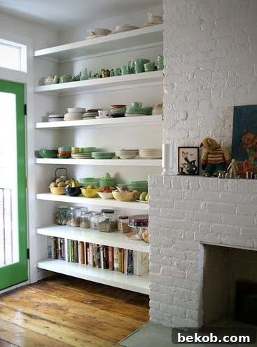 Simple yet effective floating shelves flanking a fireplace, providing open display space.