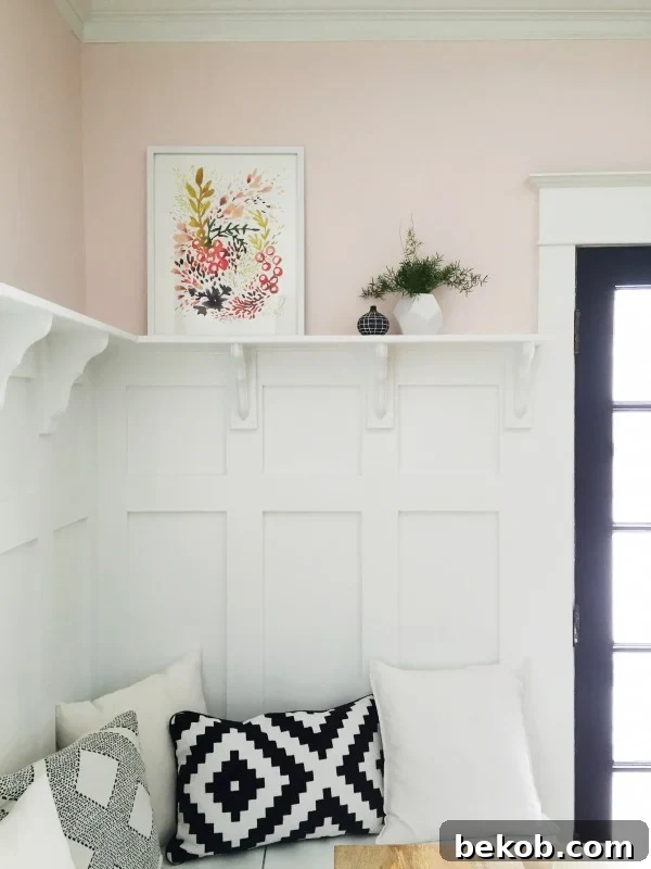 Evolving Dining Spaces Banquette Style 11 Detailed shot of elegant board and batten wainscoting above a dining room banquette, adding architectural interest.