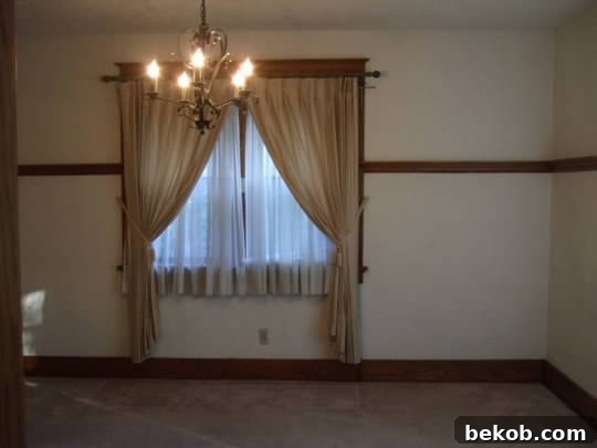 Evolving Dining Spaces Banquette Style 2 Before shot of a dining room renovation, showing a blank canvas space prior to any design work.