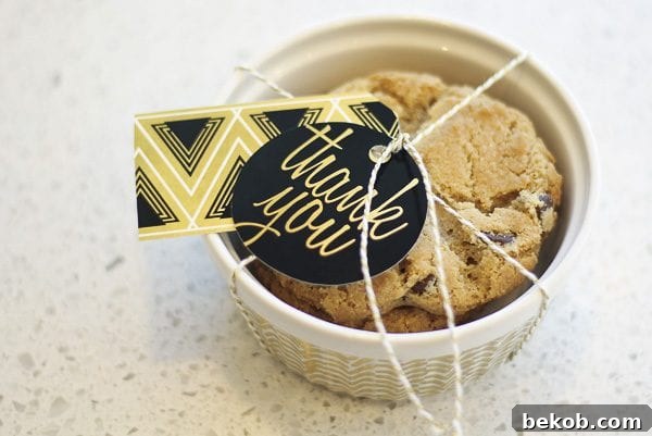 Cookies in a ramekin with layered printable gift tags attached, ready as a thoughtful thank you gift