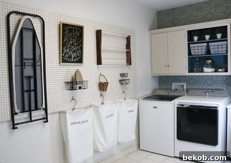 Organizing laundry supplies on the newly installed pegboard, showcasing its functional versatility.