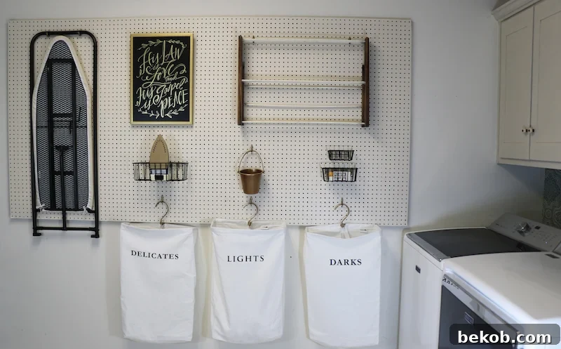 A detailed view of the installed pegboard, highlighting its clean finish and potential for organized storage.