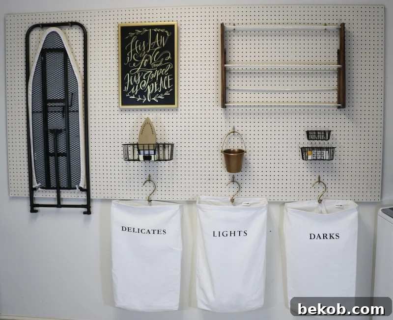 The newly organized laundry room featuring the DIY pegboard, demonstrating ample space for additional items.
