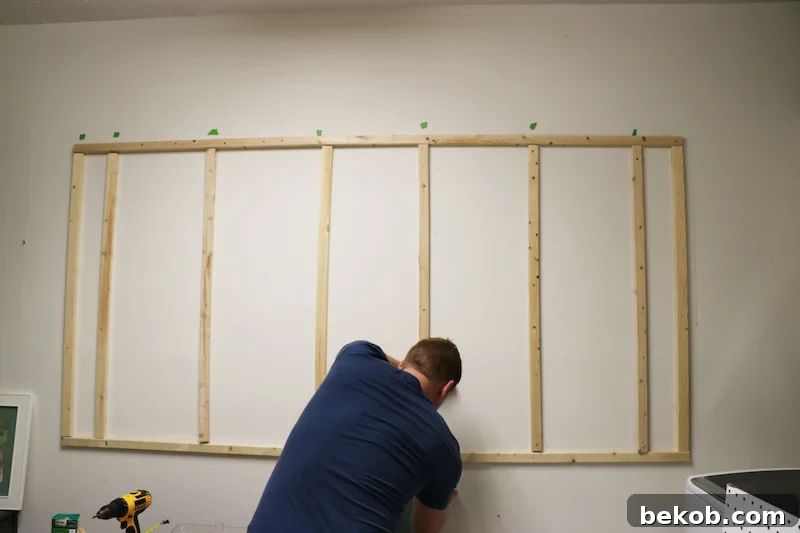 The completed furring strip frame, reinforced with additional supports for enhanced stability.