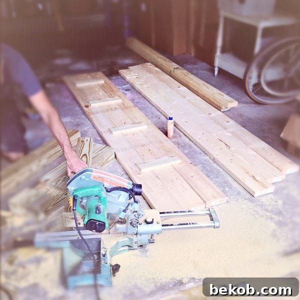 DIY beachy distressed console table in construction, showing the assembled tabletop ready to be joined with the frame. By Shabbyfufu featured on @Remodelaholic