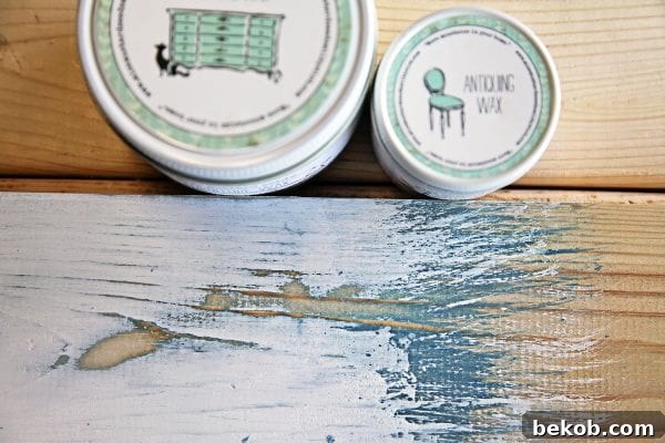 How to layer milk paint colors to achieve a beachy, distressed look when painting newly built side console table by Shabbyfufu featured on @Remodelaholic