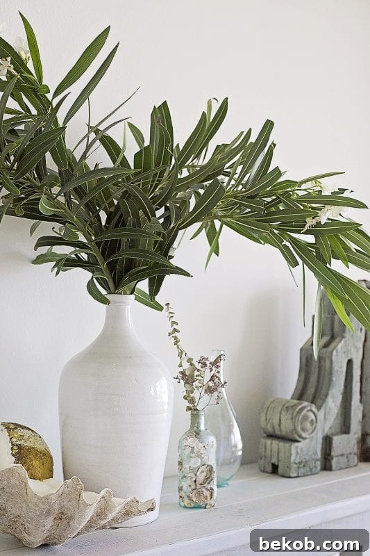 Create a beach feel in your home using this console table tutorial and milk paint layering technique by Shabbyfufu featured on @Remodelaholic