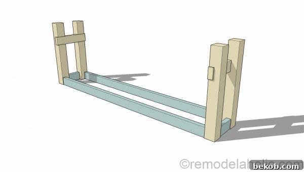 Close-up view of the leg and support assembly, highlighting the secure connection crucial for the table's stability. Plans by @Remodelaholic