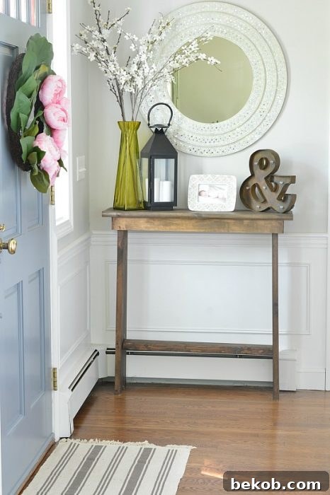 Budget-friendly DIY entryway hall console table for $30 by Wife In Progress, offering style on a shoestring budget.