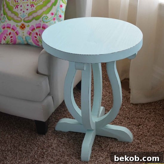 Elegant DIY curvy side table, an advanced woodworking project by Hertoolbelt that defies typical DIY expectations.
