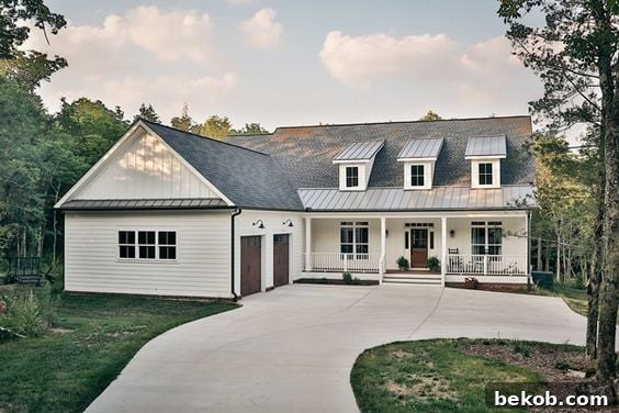 Modern farmhouse exterior with clean lines, contrasting trim, and subtle landscaping for curb appeal ideas.