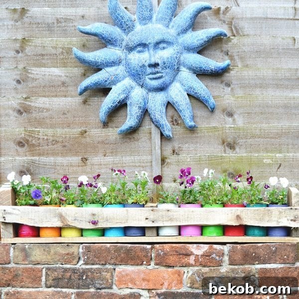 colorful-tin-can-planter-pillar-box-blue
