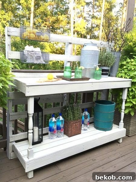 rustic-farmhouse-serving-area-idea-made-from-a-pallet-outdoor-potting-table-serves-as-buffet-or-drink-service-area