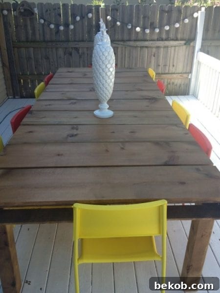 outdoor-dining-table-with-red-chairs-768x1024