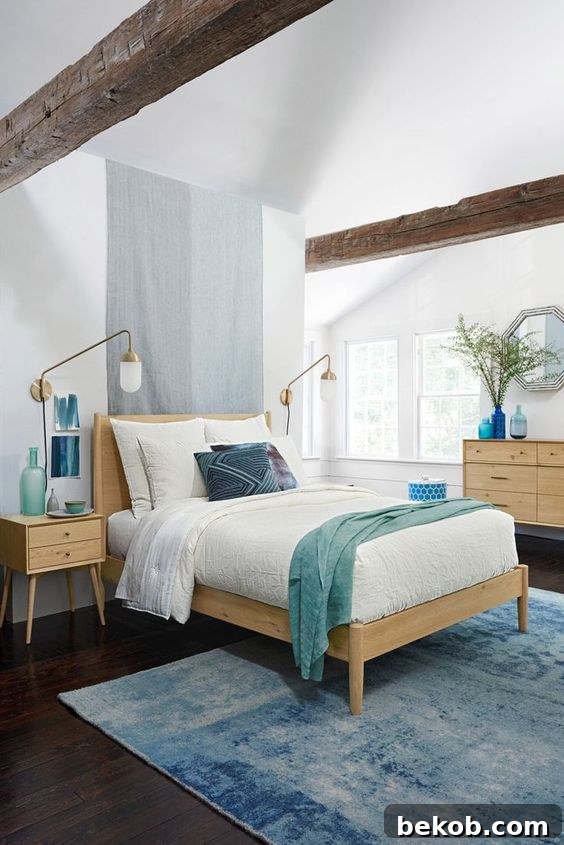 Airy Modern Coastal Bedroom with Striped Bedding and Greenery