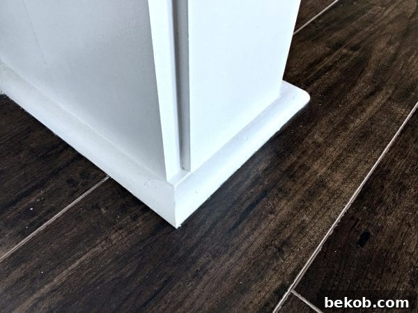Adding optional base trim to cover a gap between the new casing and the floor.