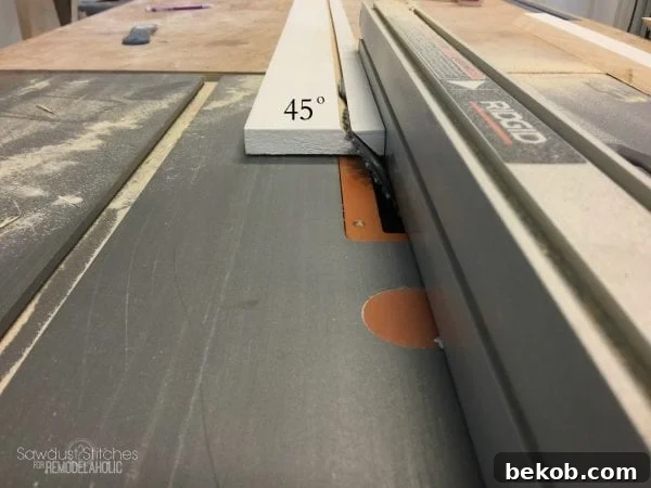 Cutting 1x4 boards with 45-degree angles on a table saw for corbel construction.