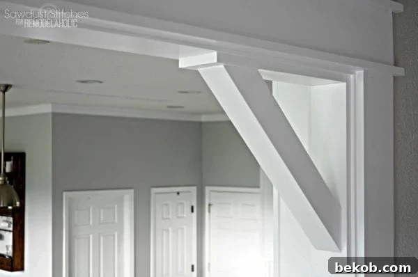 Decorative casing and corbels installed, showcasing the enhanced doorway aesthetic.
