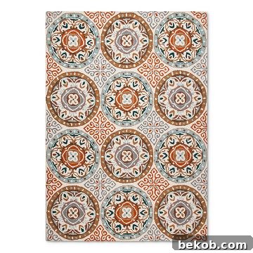 Colorful dining room idea: patterned Suzani rug introduces vibrant hues and intricate designs, transforming a neutral space with global charm.