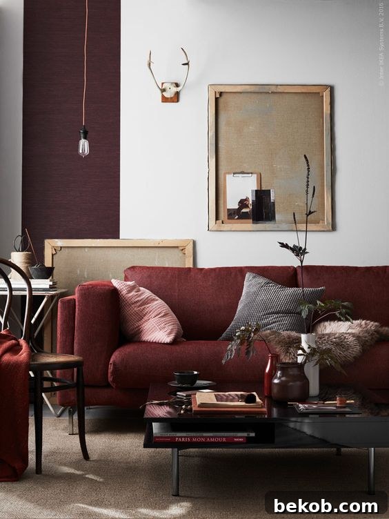 Decorating a neutral living room, with a burgundy couch