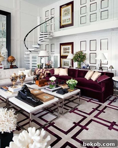 Decorating a neutral living room, with a maroon couch